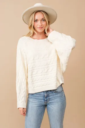 Horizontal cable knit dolman sleeve sweater